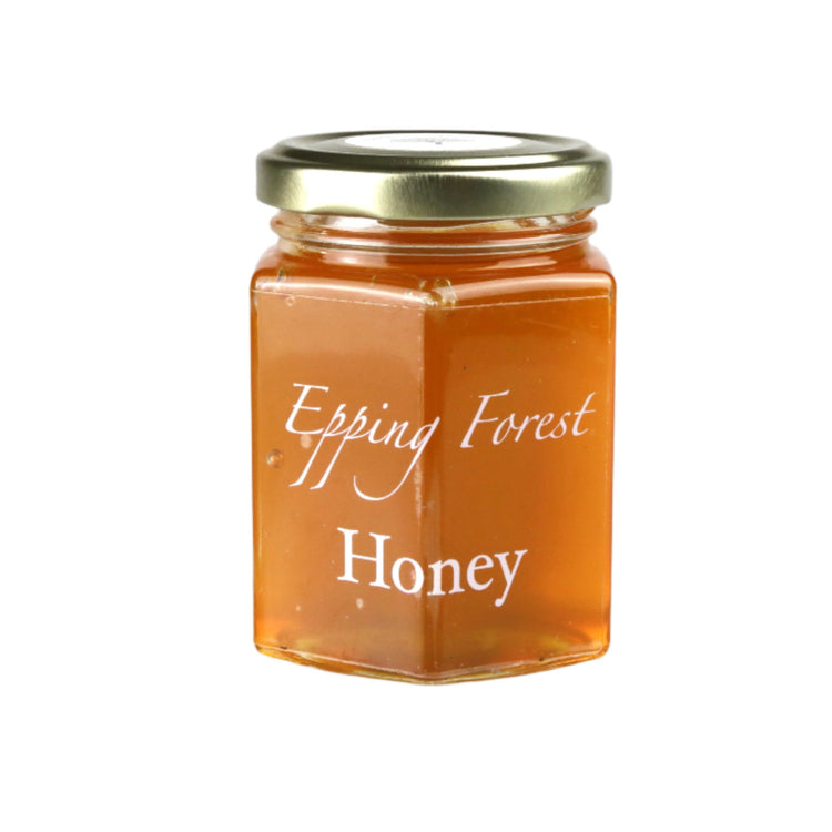 Jar of Epping Forest Honey on a white background
