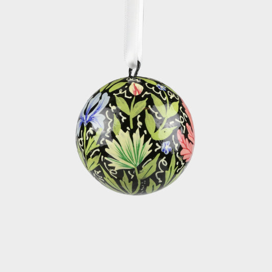 Decorative spherical ornament with floral patterns on a gray background