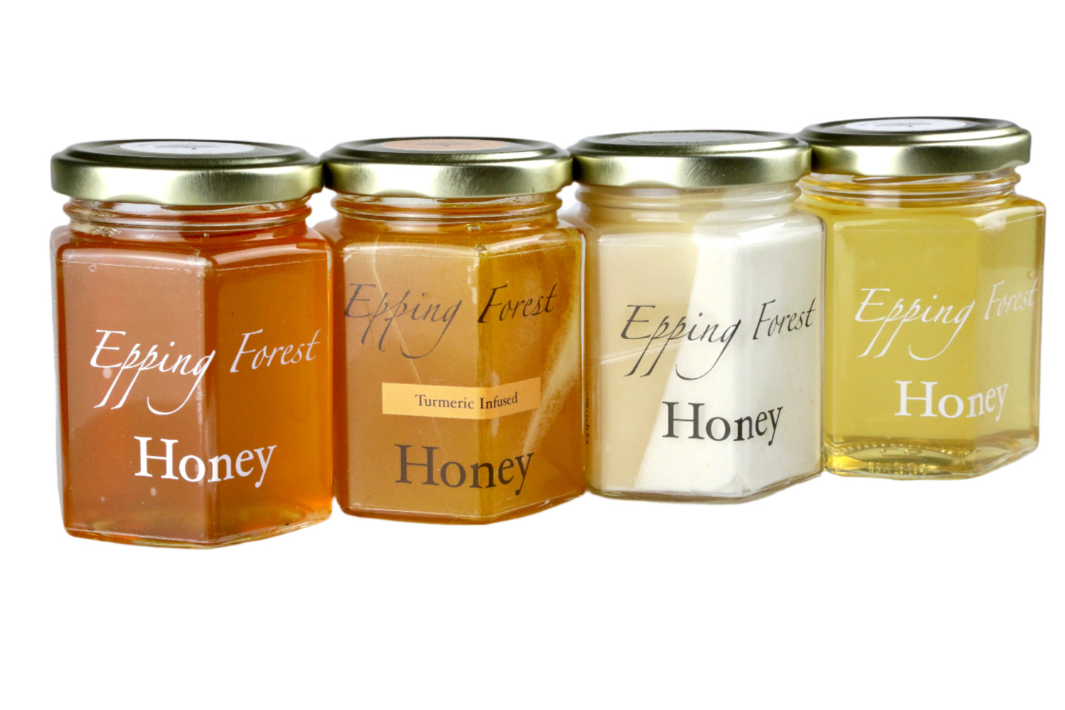 Four jars of Epping Forest Honey on a white background