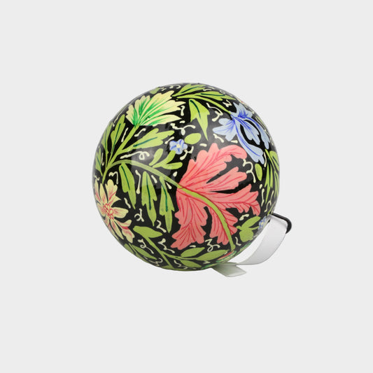 Decorative ball with floral pattern on a gray background