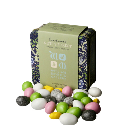 Tin of William Morris Gallery Nutty Forest candies on a gray background