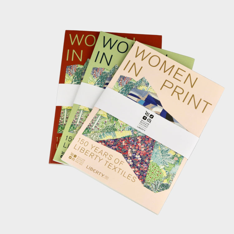 Four books titled 'Women in Print' on a gray background