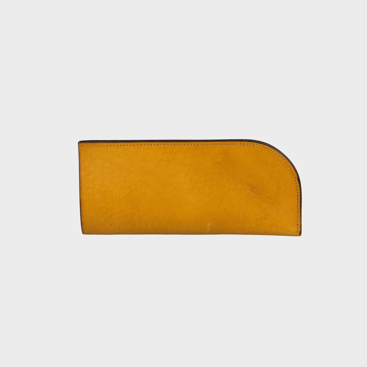 Brown leather wallet on a gray background