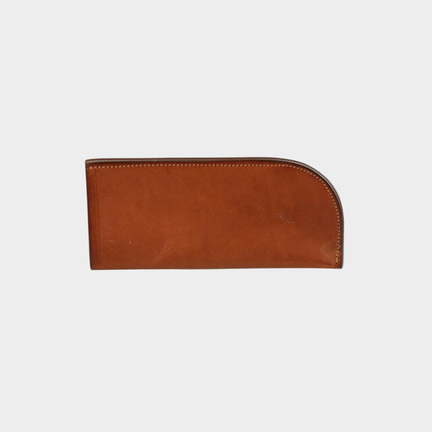 Brown leather wallet on a light gray background