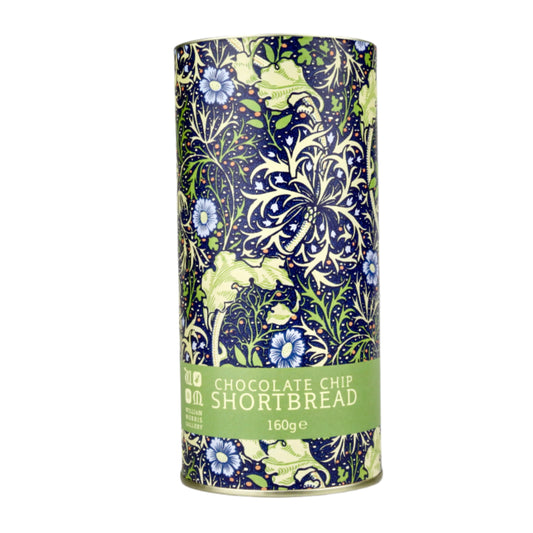 Floral-patterned cylindrical cookie tin with 'Chocolate Chip Shortbread' text on a gray background