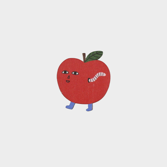 Cartoon apple with a worm on a gray background