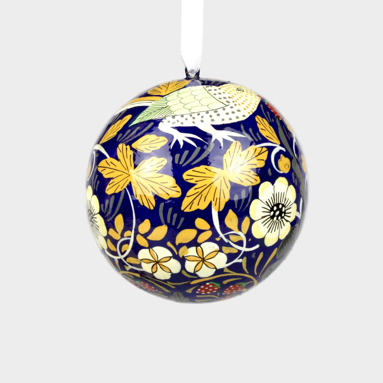Decorative ball ornament with floral pattern on a plain background