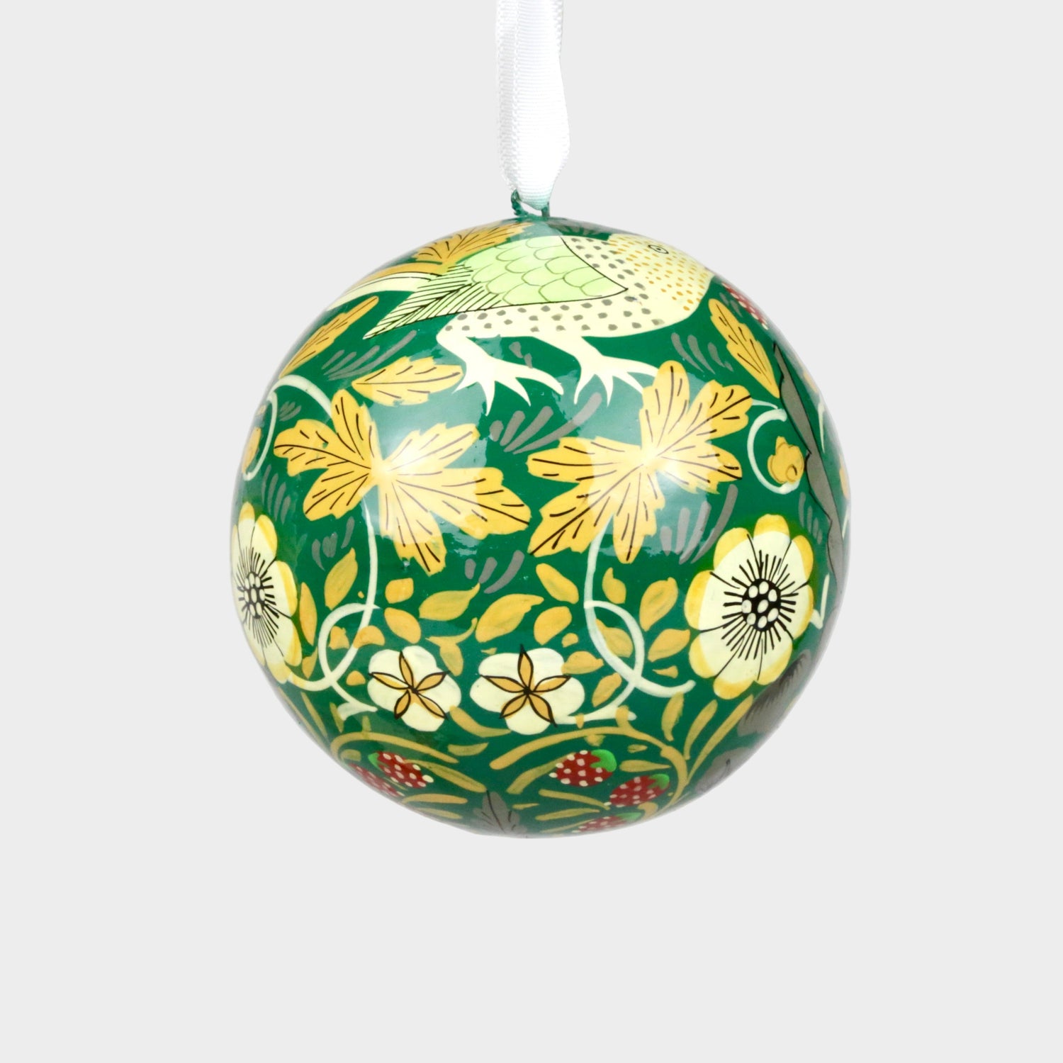 Decorative ball ornament with floral pattern on a plain background