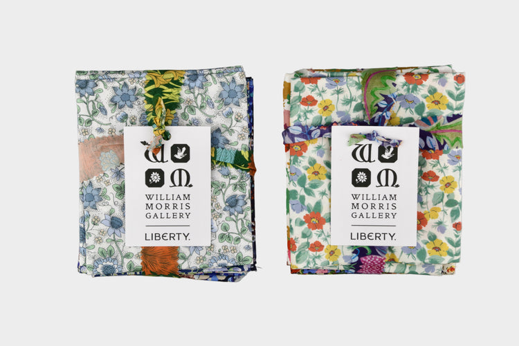 Two floral-patterned boxes with 'William Morris Gallery Liberty' branding on a gray background.