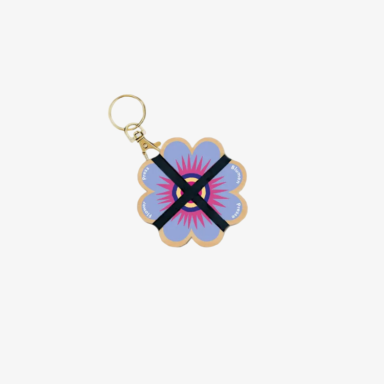 Keychain with a floral design on a beige background